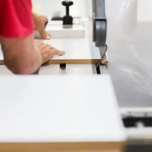 depositphotos 189782652 stock photo carpenter with panel saw and